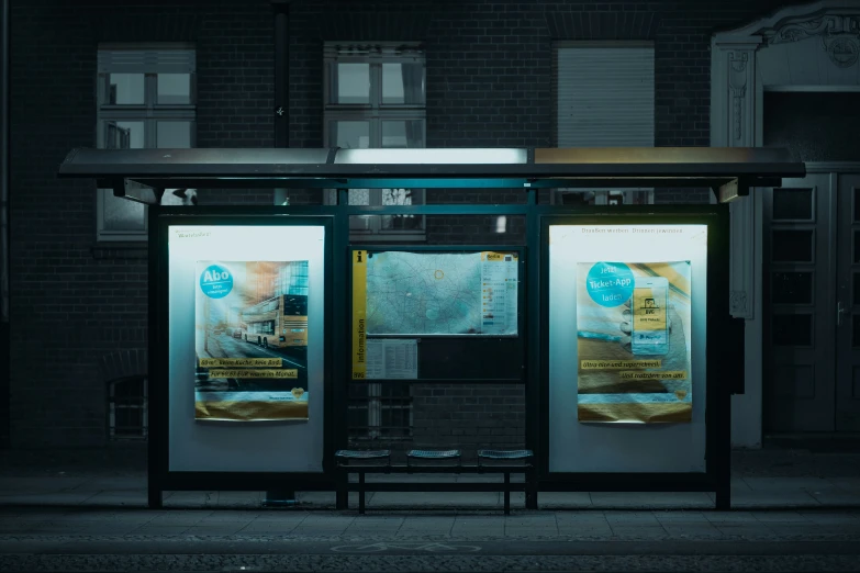 some kind of information board sitting outside a building