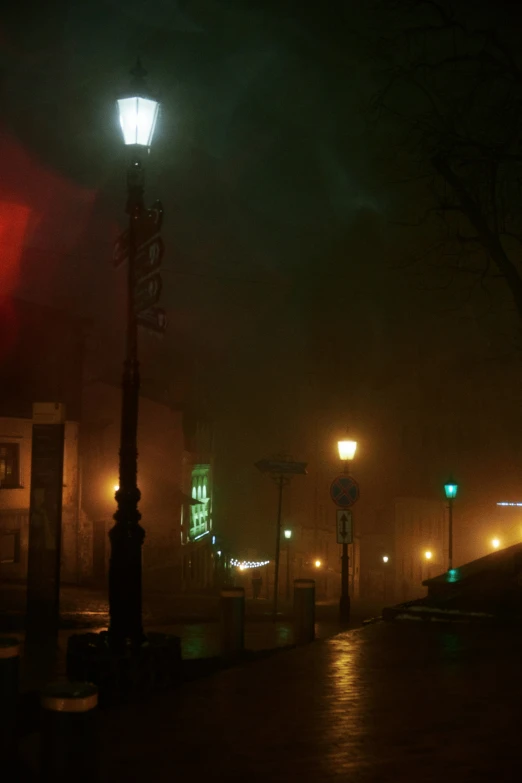 a street that has some lights and a clock tower