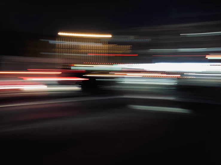 traffic in motion with blurry cars moving at night