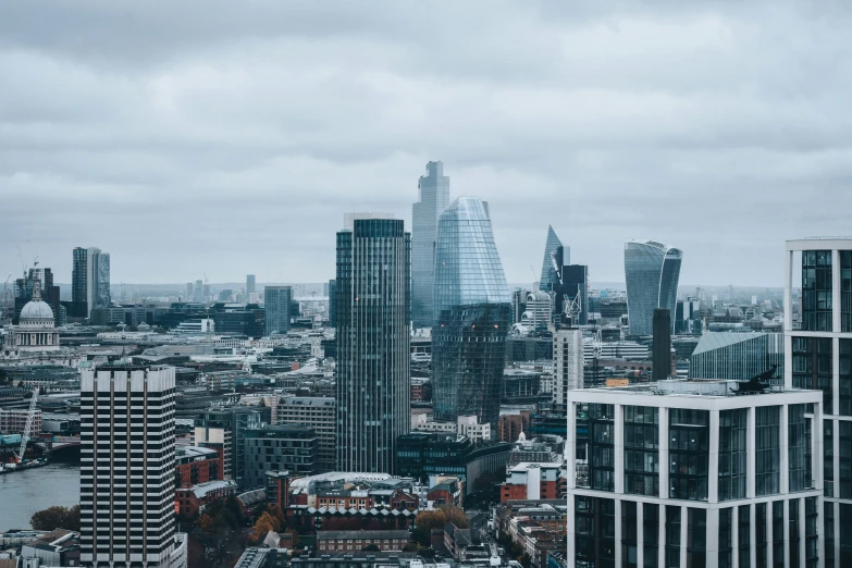 cityscape from high up with skyscrs and cloudy sky