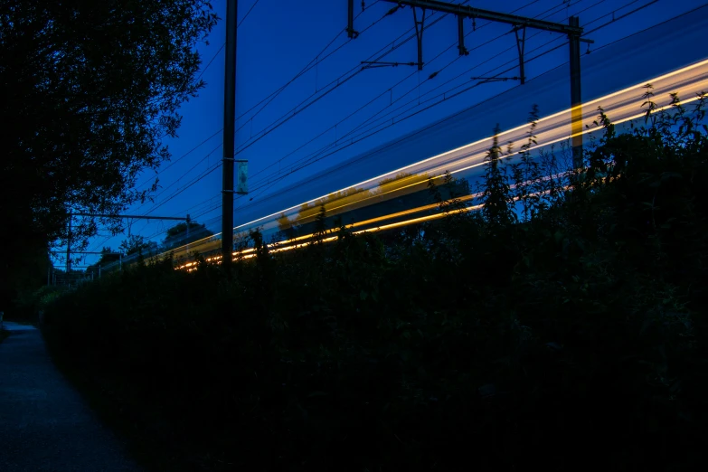 train passing in distance with motion blured