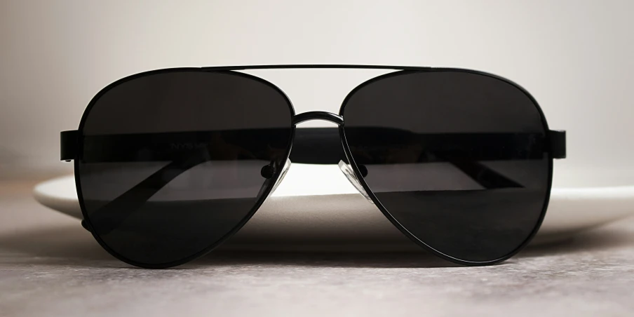 sunglasses on white and black background