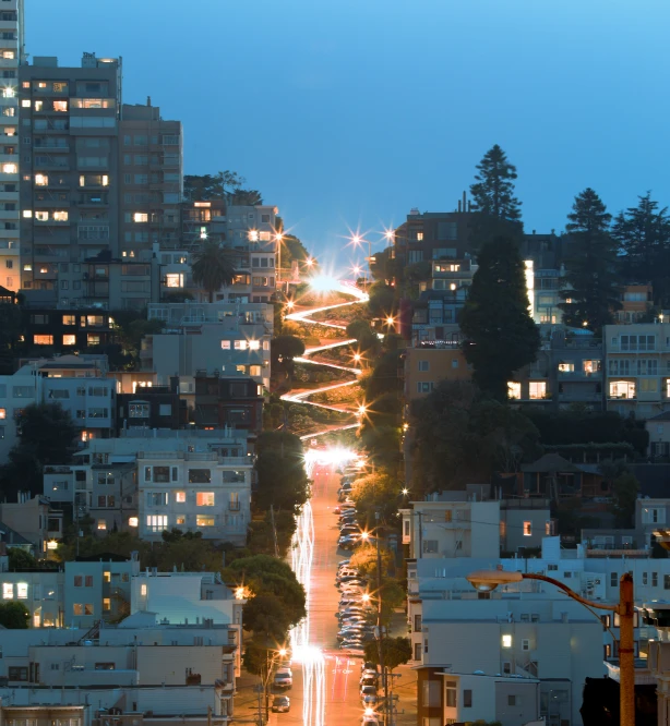 an urban scene at night from across the street