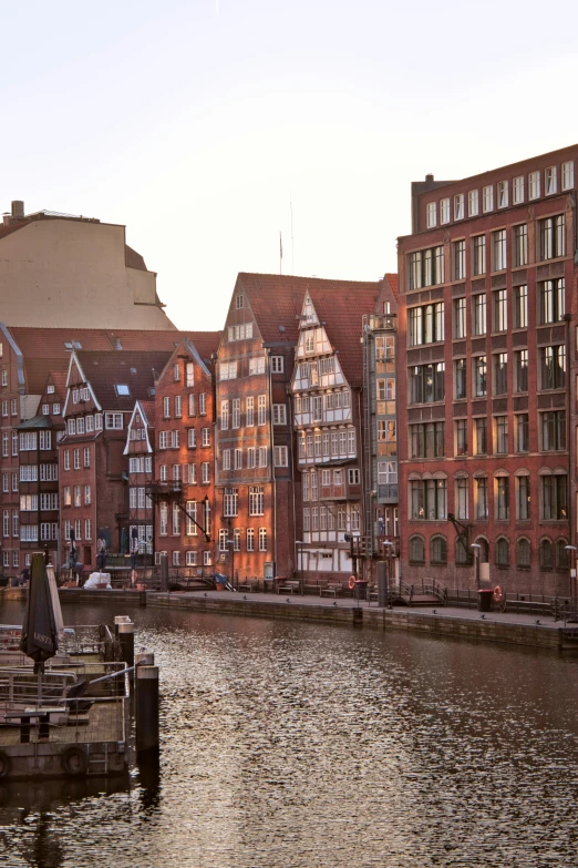 buildings near the water and boats in it