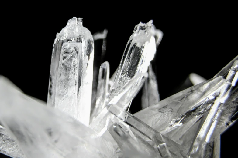 an image of close up ice crystals in black and white
