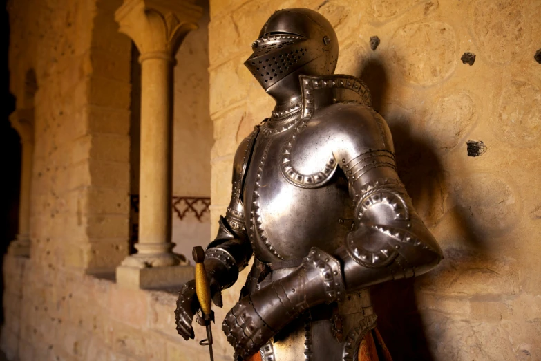 a close up of an elaborate armor on a person