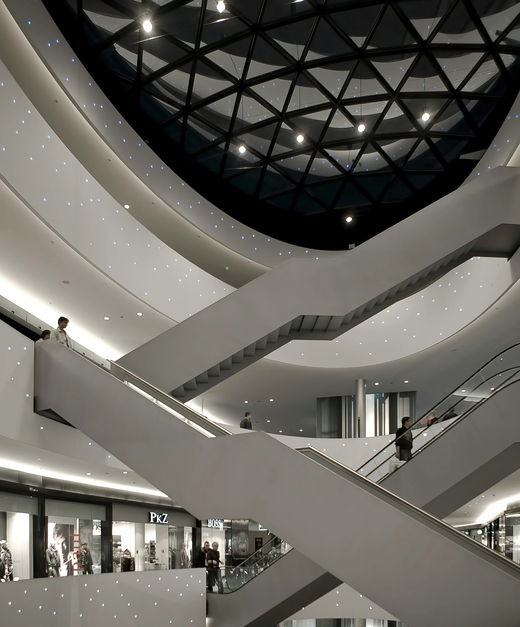 a large white building with many stairs in it