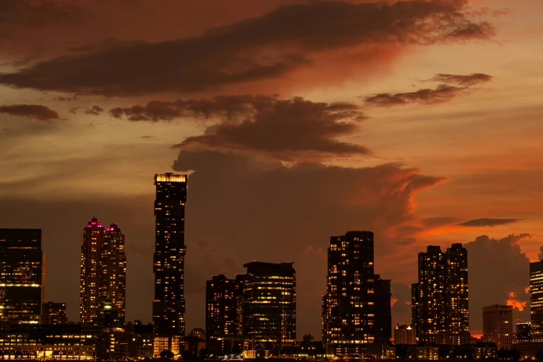 the skyline of a city illuminated with bright lights