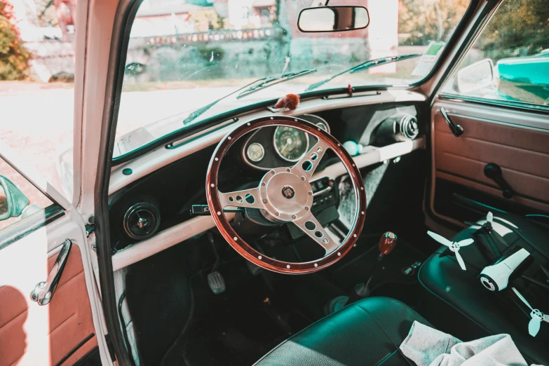 the dashboard in an old car parked on the street