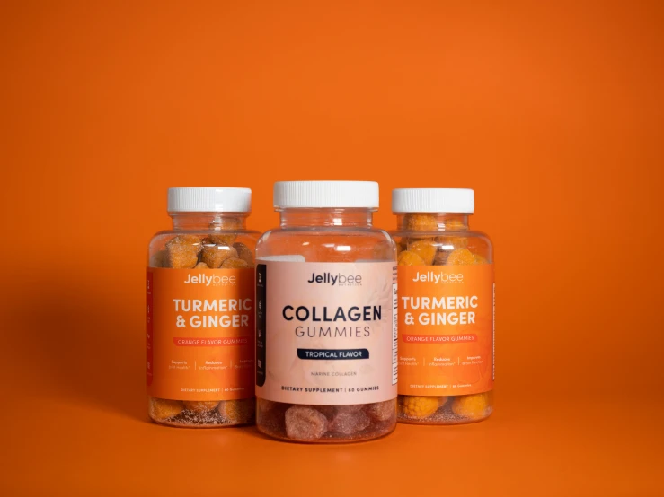 three different bottles of collagen gums with orange background