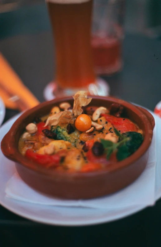 a bowl with some food and a drink