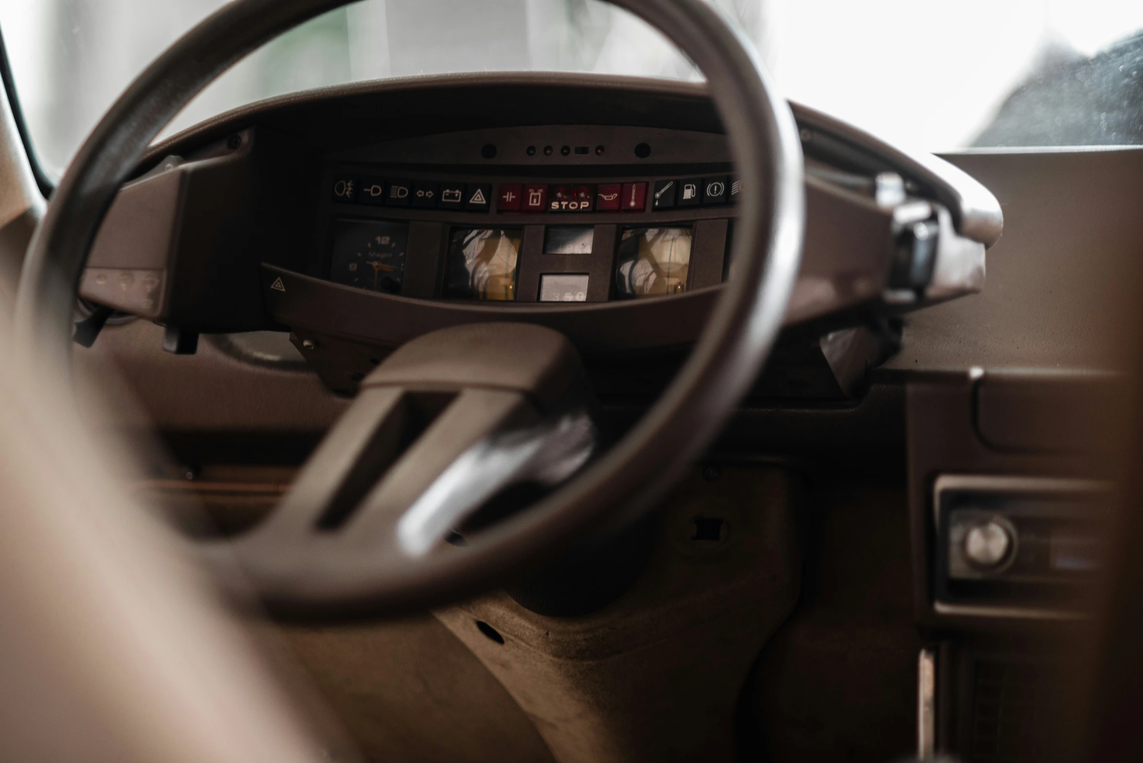 the inside of an old car with ons and gauges