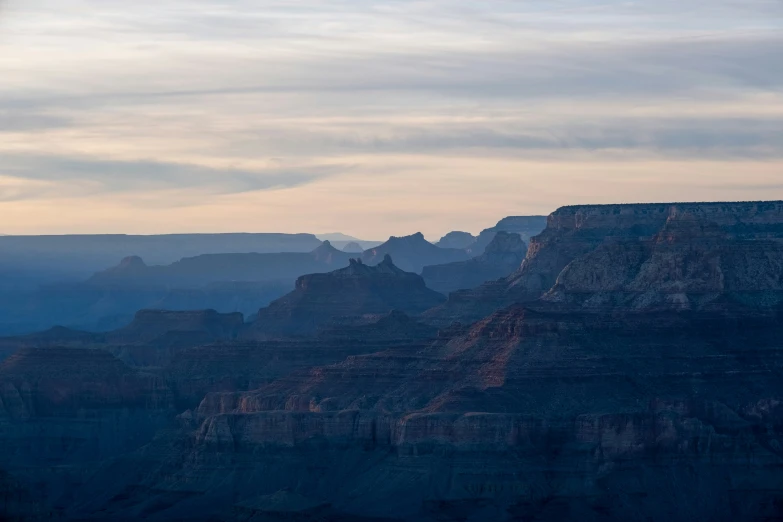 a po of mountains taken at sunset from a distance