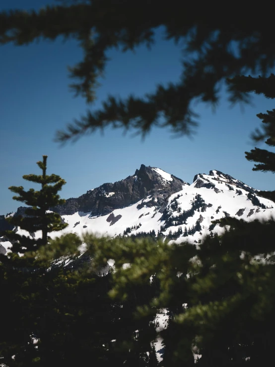 some very pretty mountains in the distance with some snow on them