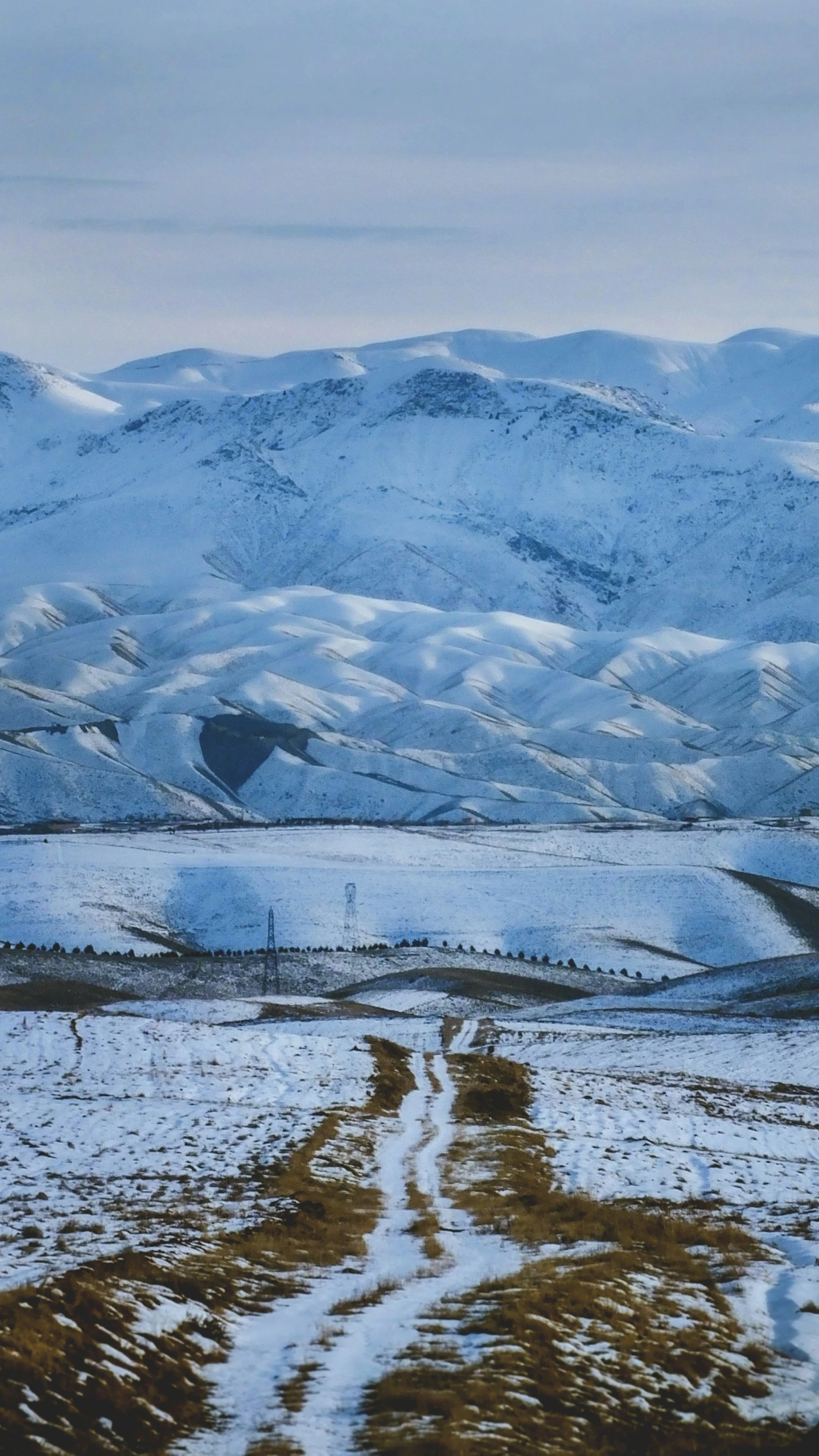 a view of the mountain with very high snow