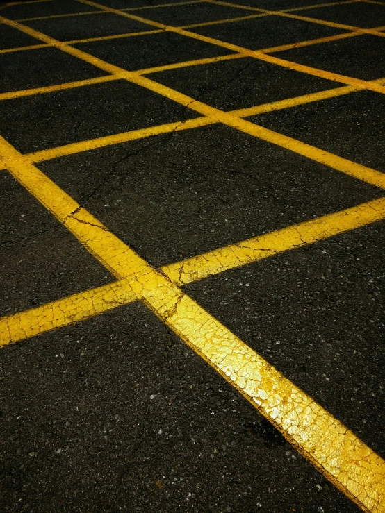 a yellow street sign on the side of the road