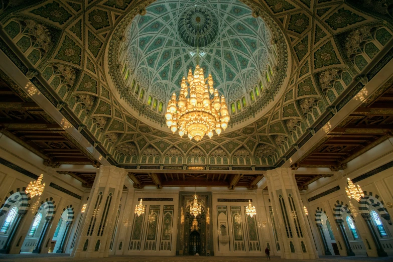 the beautiful chandelier in the middle of the building