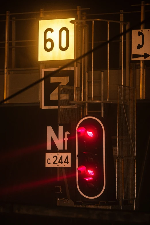 a traffic signal sitting in front of a building