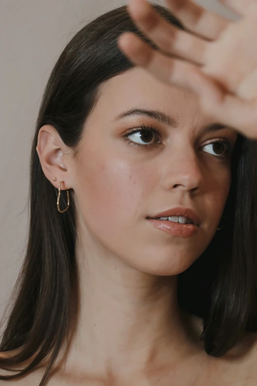 a close up of a woman with long hair