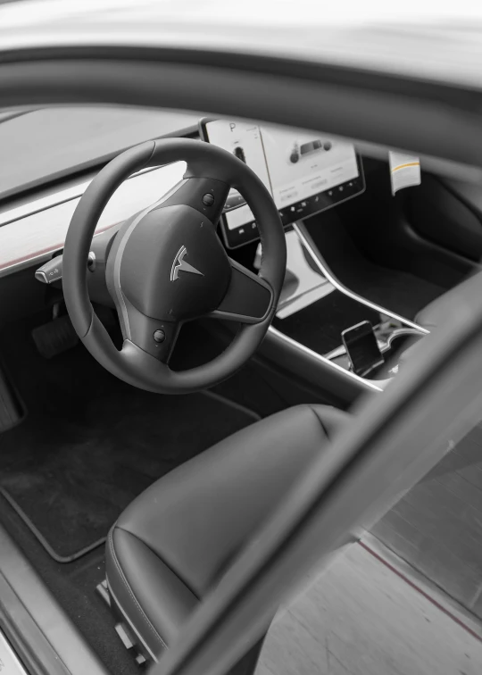 a car dashboard is shown in black and white