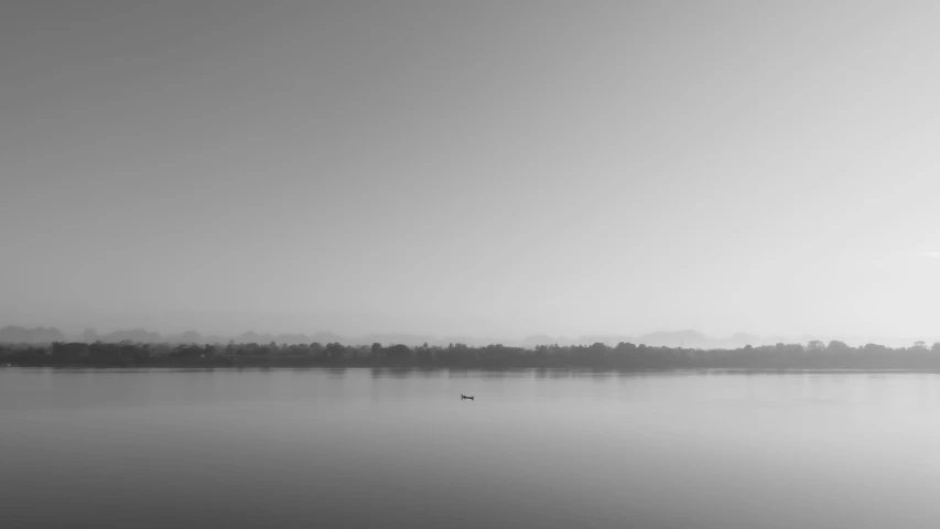 an empty lake with water that is still clear