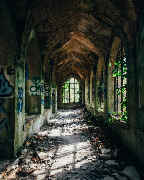 this is an old abandoned building covered in graffiti