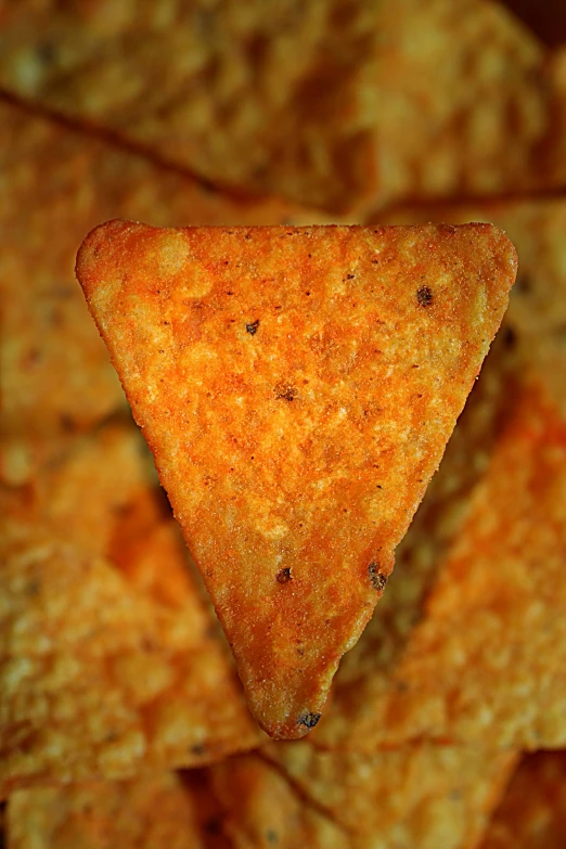 a triangle shaped er on top of some chips