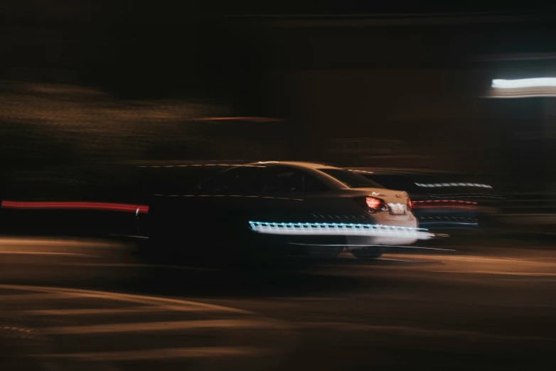 blurry pograph of a police car in motion