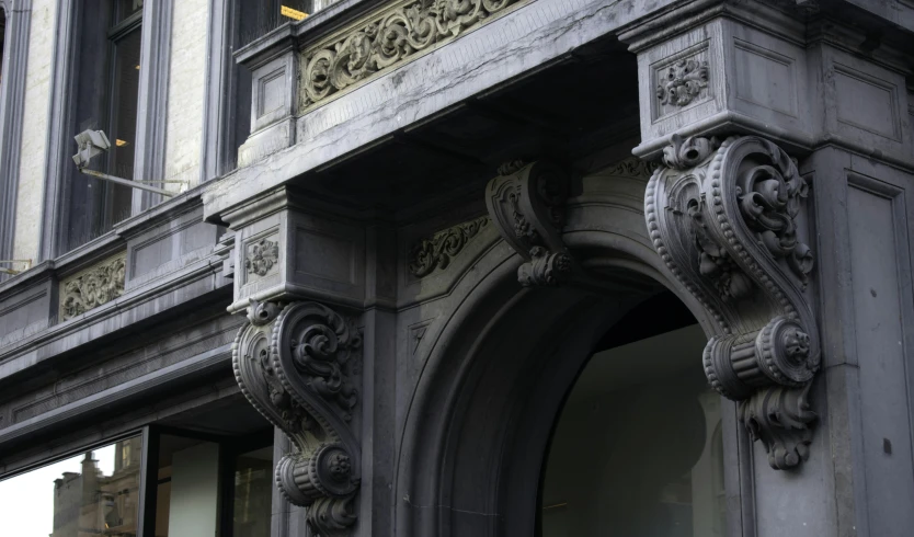 an ornate doorway on the front of a building