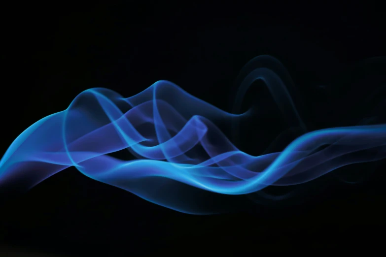 the smoke is blue and the black background has some waves in it