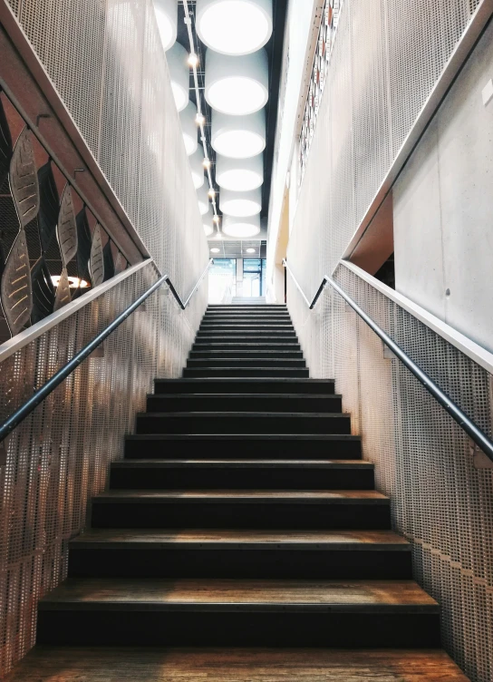 stairs going down with light at the top