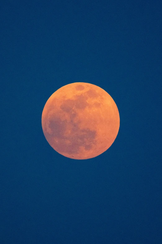 the moon has a slightly orange hue