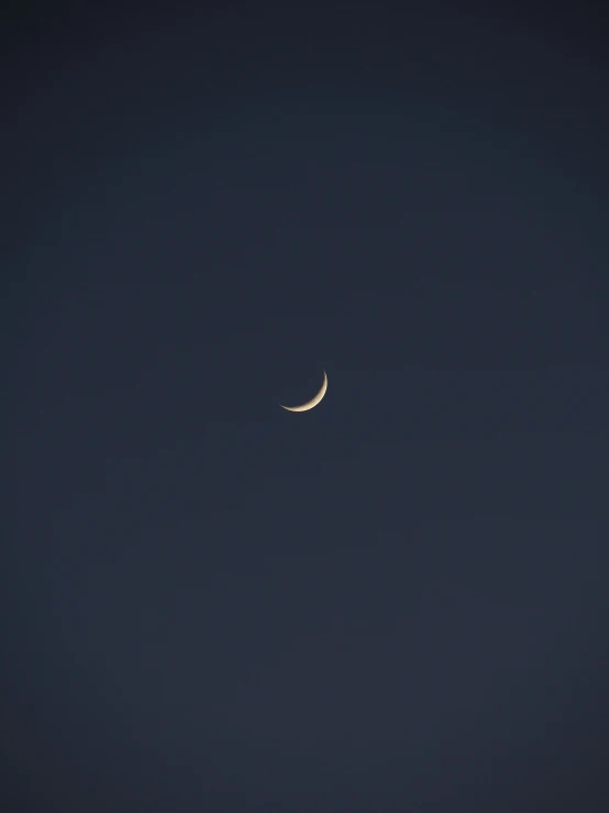 half moon at night and half of the moon in the sky