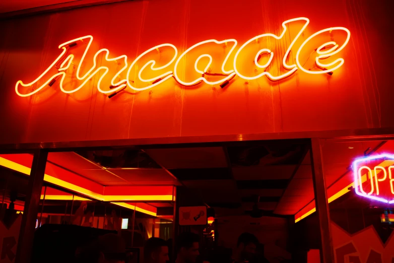 a neon sign that reads, arcade on it