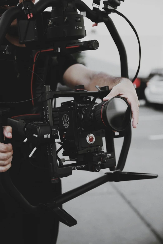 a camera being held by someone who is taking a po