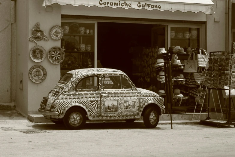 the car is decorated with many different patterns and designs