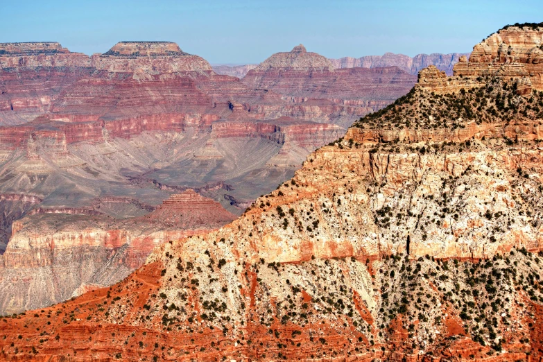 some very big mountains with many orange rocks