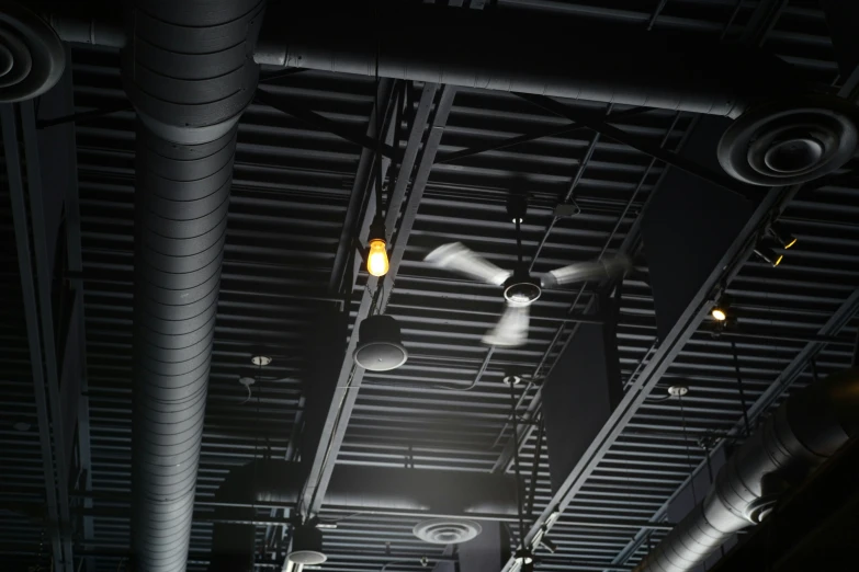 there are three ceiling fans that have been suspended