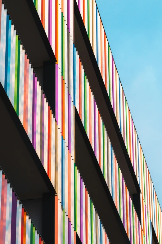 multicolored striped building with modern architecture