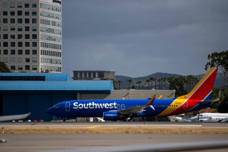a southwest plane is sitting in the runway