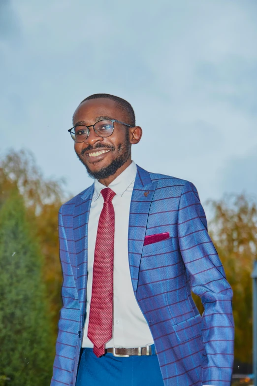 a man in a blue and red suit