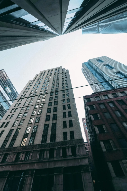 tall buildings seen up high with the sky overhead