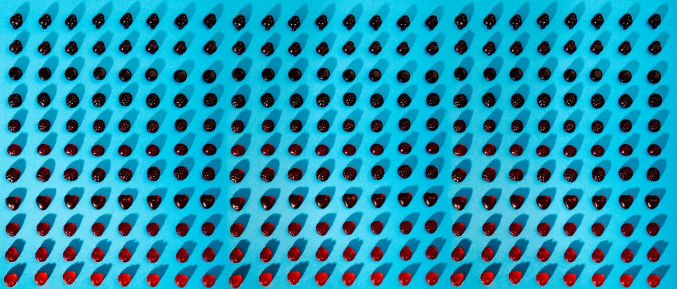 a very colorful blue wall with circles