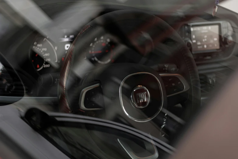 a close up of a steering wheel with a gps