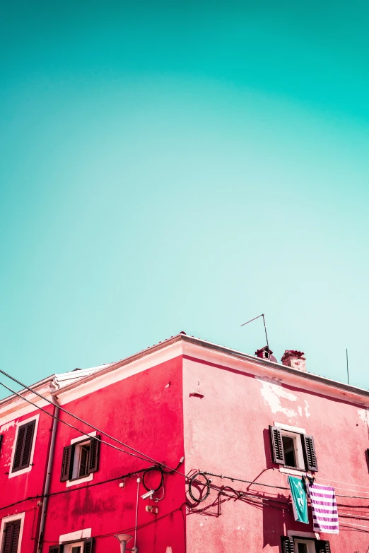 a tall building sitting on the corner of a street