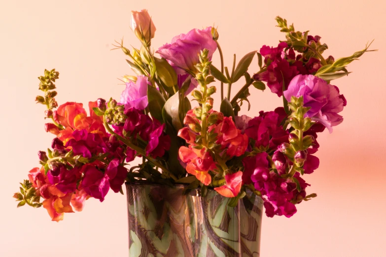 the flowers are in a vase on a table