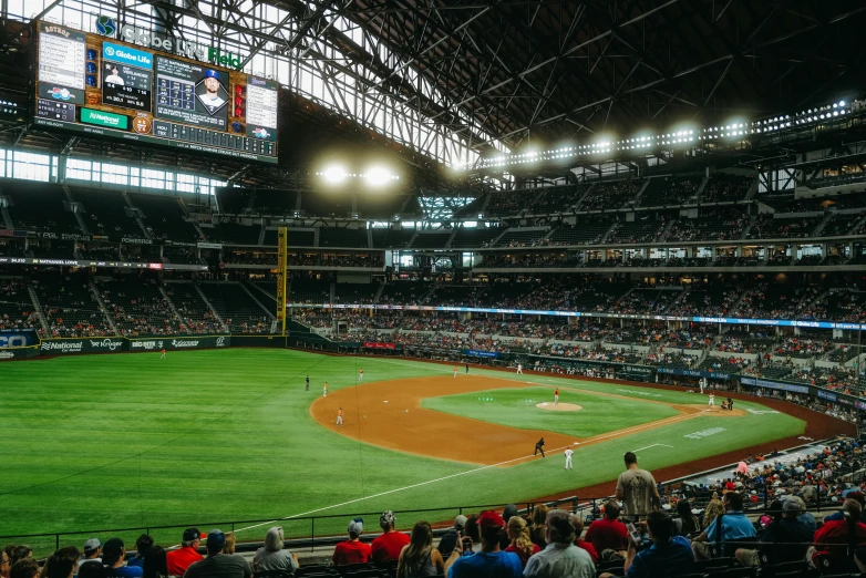 the interior of a stadium filled with people