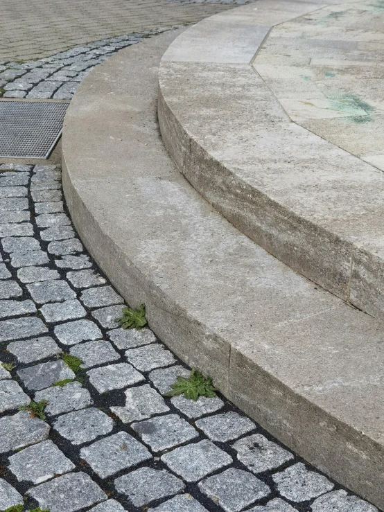 steps and steps outside on cobblestone pavement