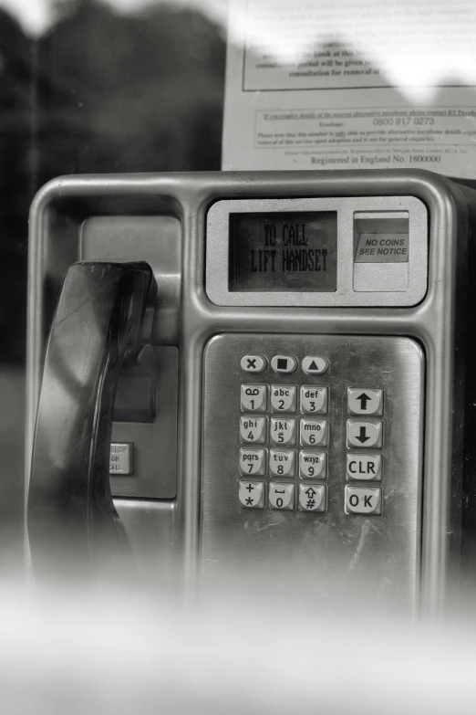 this black and white po shows an old phone