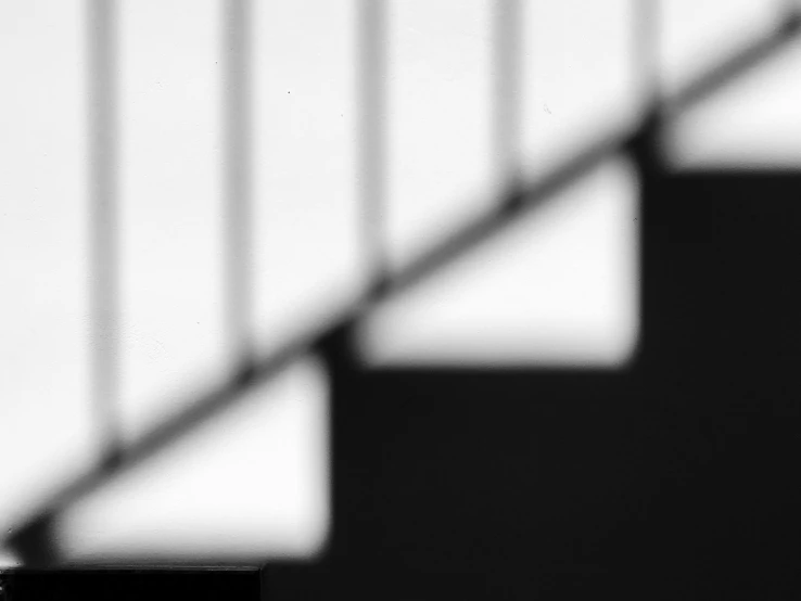 black and white po of a stairwell railing